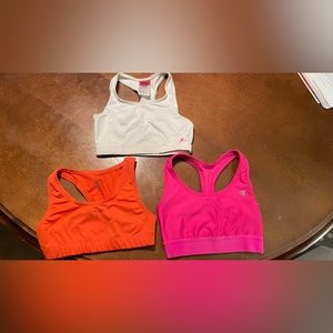 Three sports bras gently used